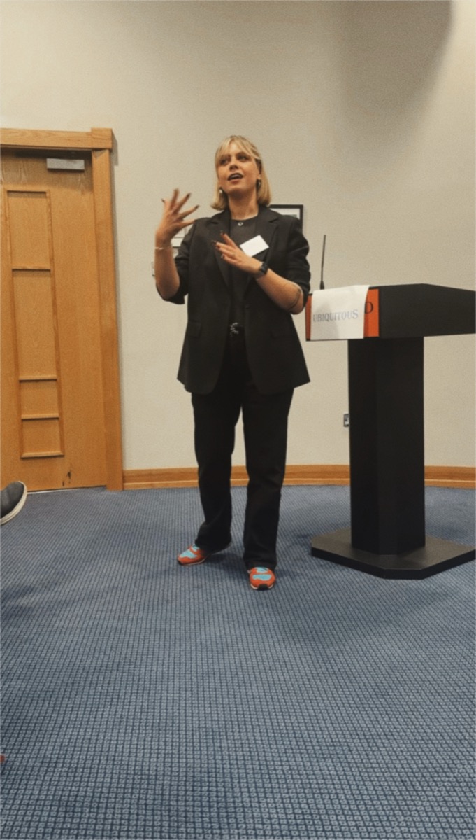Egle speaking at an event