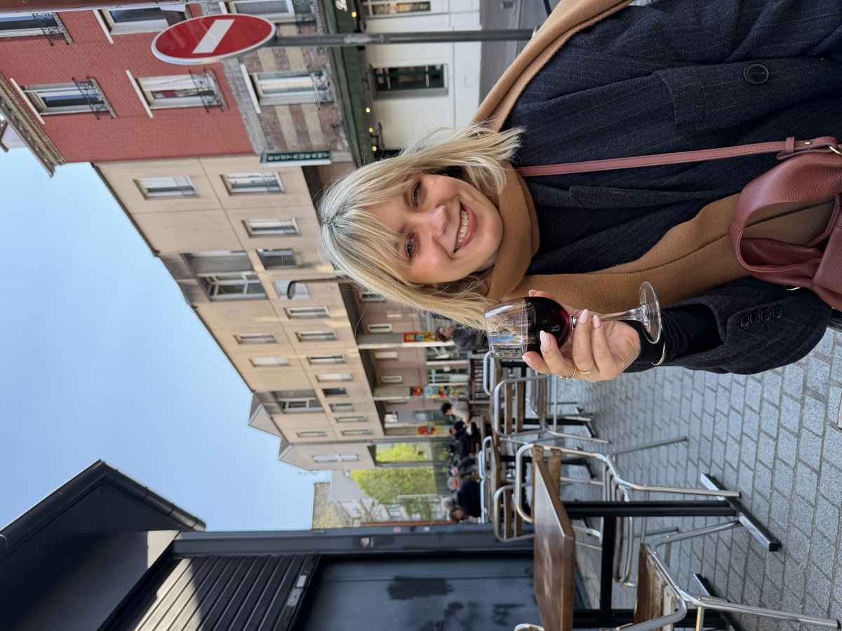 Egle sitting outside a café